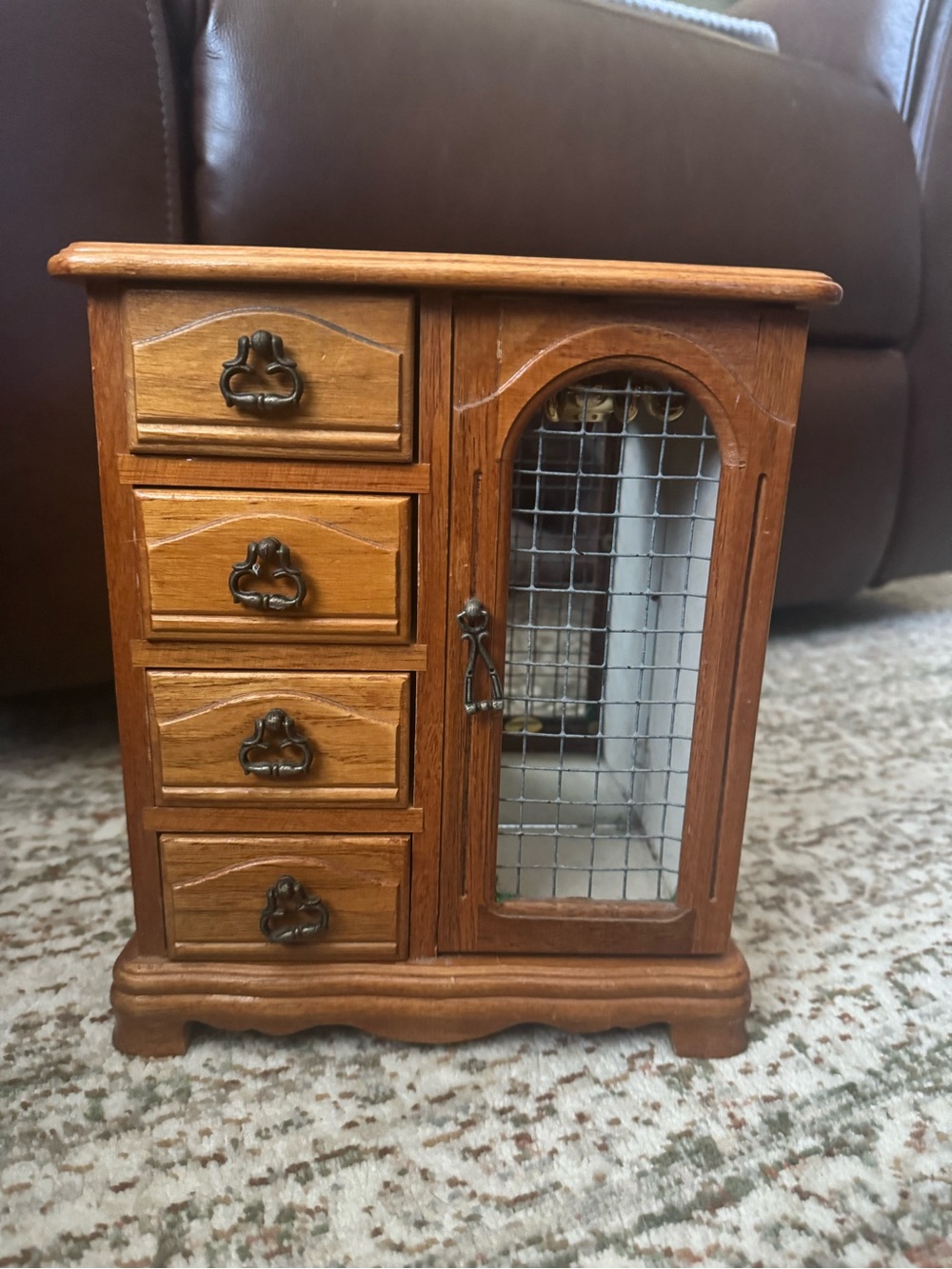 Brown Wooden Jewelry Cabinet with Mirrored Wire-Front Door